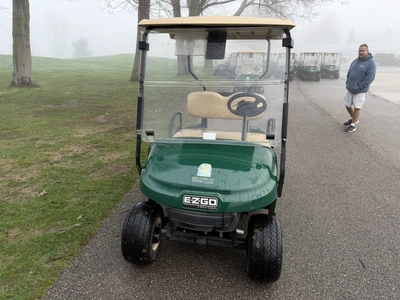 (1) 2017 E-Z-Go golf cart with a Kawasaki gas engine, model 625111G01, includes canopy, ball cover, ...