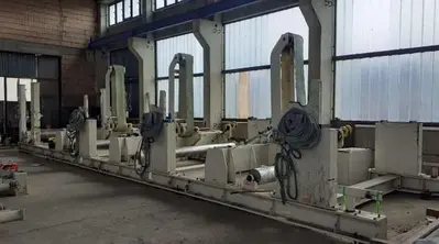 USED 2001 TOSCHI TWO DRUM TISSUE SLITTER REWINDER