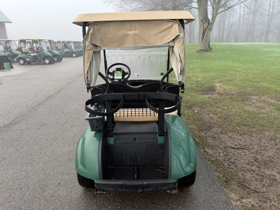 (1) 2015 E-Z-Go golf cart with a Kawasaki gas engine, includes canopy, ball cover, club cover, fold-...