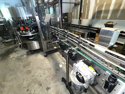 Complete KOSME Bottling Line Includes Depalletizer, Barifill Glass Filler & Flexa Labeler
