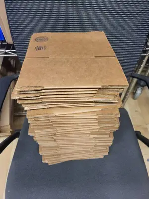 Stack of Uline 6x4x4 Corrugated Shipping Boxes S-4060