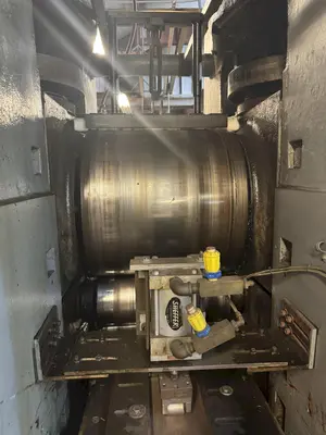 20" WIDE X 22" ROLL DIAMETER 4-HI BLISS 100 HP POWERED ROLLING MILL. STOCK # 0886025