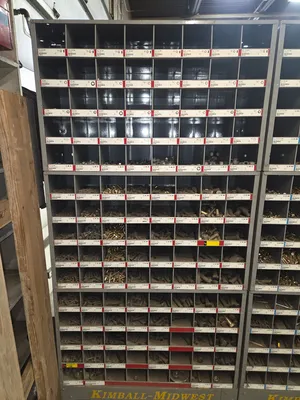 2 stacks of standard nuts, bolts, washers. 1 stack of metric nuts, bolts, washers. Comes with storag...