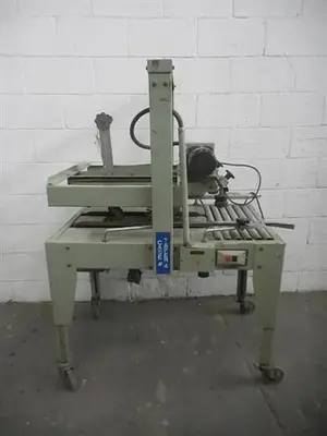 TOP and BOTTOM CARTON SEALER and TAPER