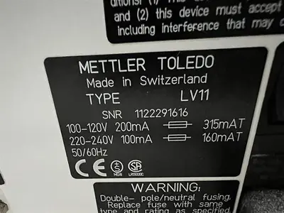 Mettler Toledo model PG203-S analytical scale with LV11 automatic feeder