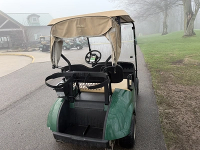 (1) 2015 E-Z-Go golf cart with a Kawasaki gas engine, includes canopy, ball cover, club cover, fold-...
