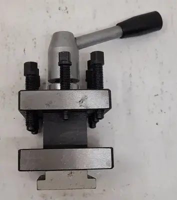 4-WAY LATHE TOOL POST H: 6-3/4” OVERALL W: 3.15IN L: 3.15IN GAP: 1-1/4IN BASE: .72IN
