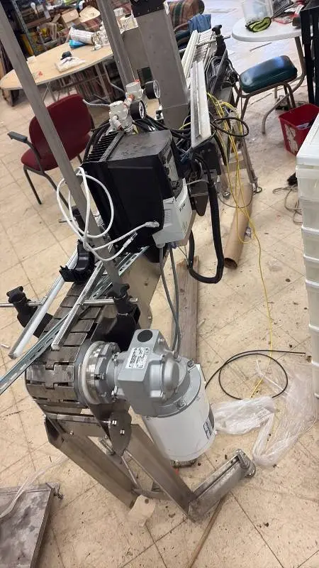 Stainless Steel Automated Conveyor System with Allen-Bradley Controls and Nord Drivesystems Motor