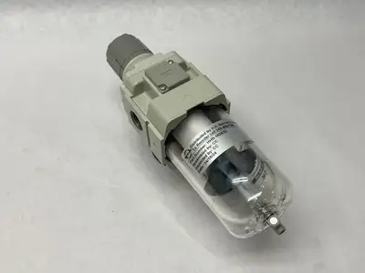 USED SMC MODULAR FILTER REGULATOR W/ GAUGE 7-125PSI SET PRESS