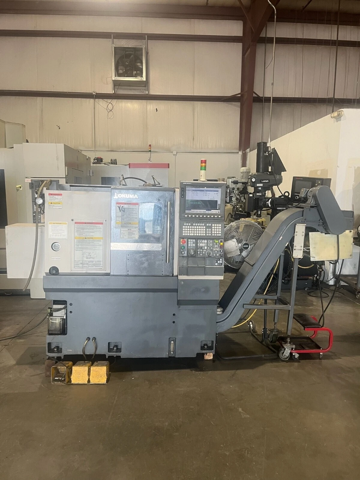 Used 2012 OKUMA GENOS L250 CNC Lathes Ohio US | Toolquip, Inc. #1326433