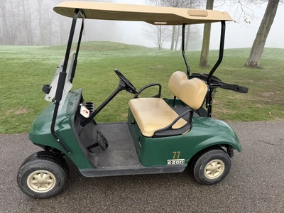 (1) 2014 E-Z-Go golf cart with a Kawasaki gas engine, includes canopy, ball carrier, fold-down winds...