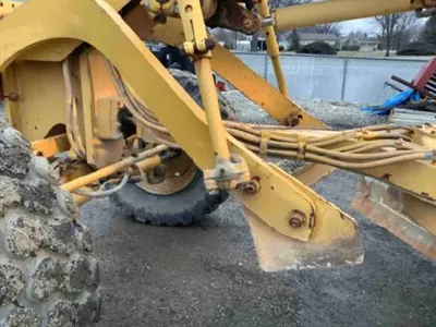 1998 Caterpillar 140HNA