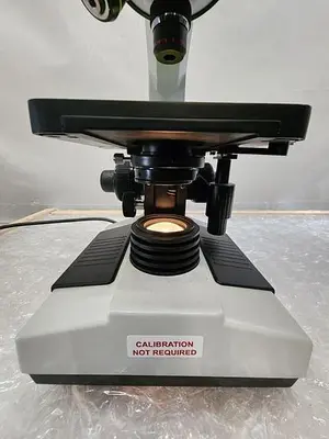 SPLIT FIELD MICROSCOPE WITH EYE PIECES, 4X4 ILLUMINATED STAGE, 3 OBJECTIVES