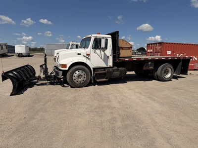 Used 1999 INTERNATIONAL 4700 4X2 WITH 10' SNOW DOGG PLOW Flatbed Trucks Michigan US | Miedema Asset Management Group #1410944