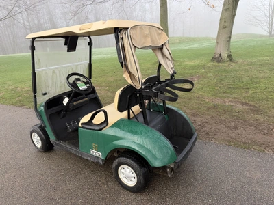 (1) 2017 E-Z-Go golf cart with a Kawasaki gas engine, model 625111G01, includes canopy, ball cover, ...