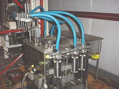USED ANDERSON PISTON FILLER 8 HEAD PISTON FILLER