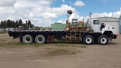USED 1980 MACK DM600 TWIN STEER HEAVY DUTY OILFIELD PUMP / KILL TRUCK