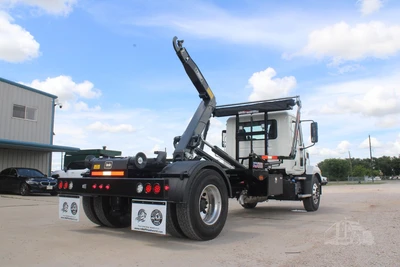 New | in-Stock 2025 MACK MD6 Hooklifts & Roll-Offs Texas US | Roll Off Truck World #1491879