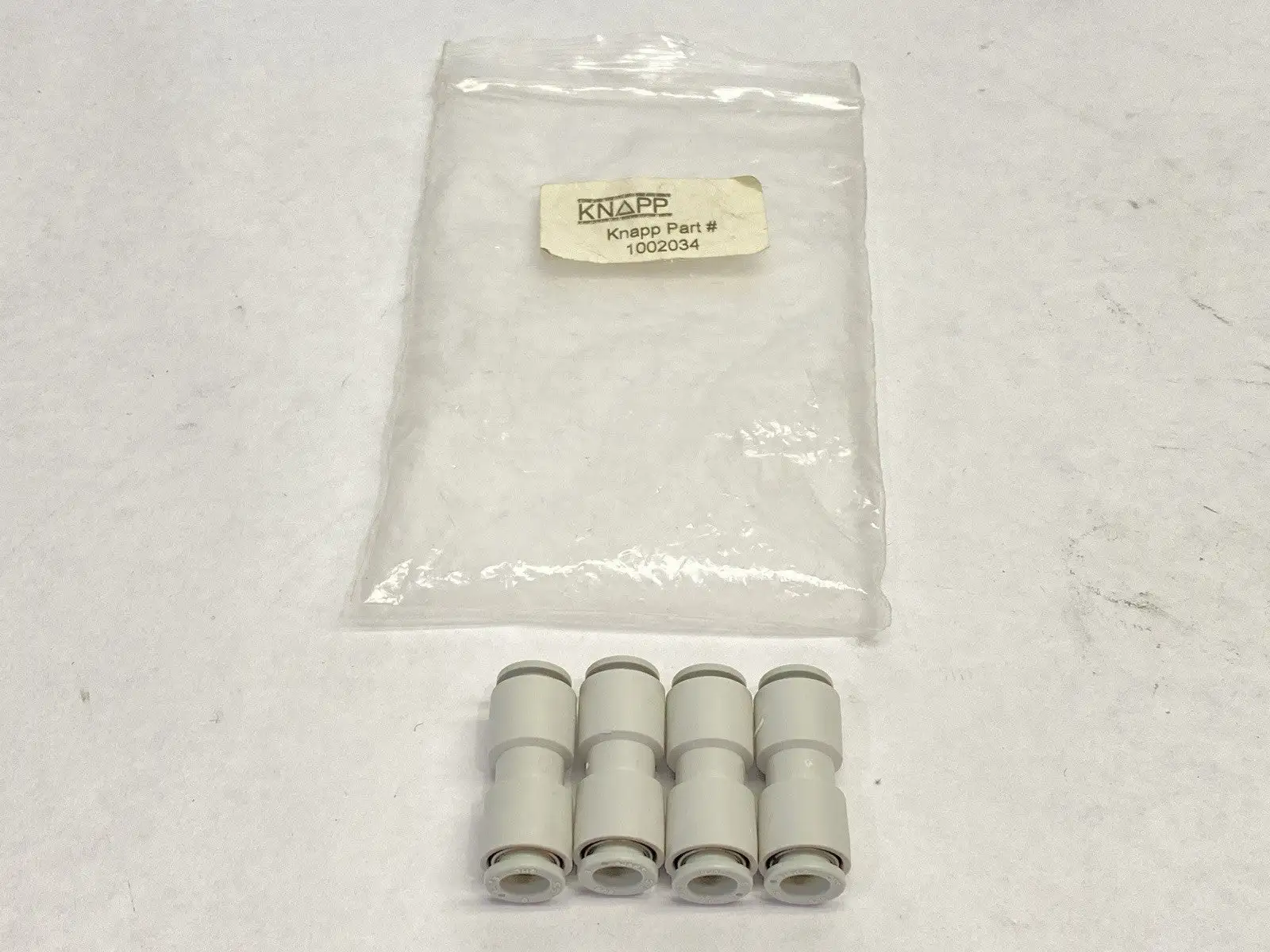 New | in-Stock Knapp Straight Link Fitting Push-In 5/16" LOT OF 4 Parts (Hydraulics and Pneumatics) Michigan US | Maverick Industrial Sales #1393548