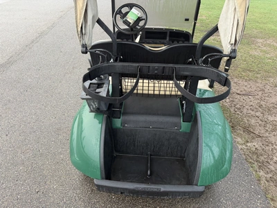 (1) 2015 E-Z-Go golf cart with a Kawasaki gas engine, includes canopy, ball cover, club cover, fold-...