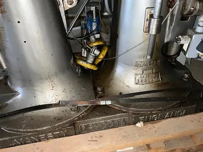 Manesty model Drycota 23 station consisting of (2) presses with transfer system