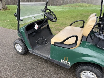 (1) 2015 E-Z-Go golf cart with a Kawasaki gas engine, does not include Club canopy, includes ball wa...