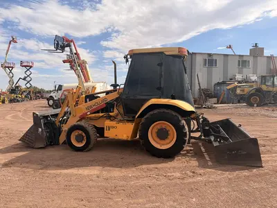 Used 2005 NEW HOLLAND LV80 Tractor Loaders Utah US | CSS Equipment Sales #1347394