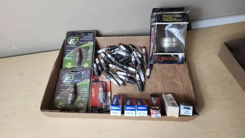 Mixed Brand Spark Plugs and Cleaner Lot including E3, AC Delco, and Champion
