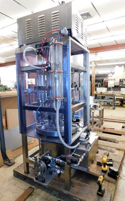 USED JG VACUUM FILLER 12 STATION