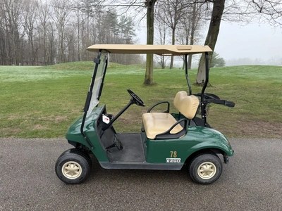 (1) 2014 E-Z-Go golf cart with a Kawasaki gas engine, does not include Club canopy, ball carrier, fo...