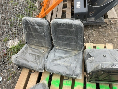 Used LOT OF (5) MINI EXCAVATOR SEATS Construction Equipment Parts Michigan US | Miedema Asset Management Group #1579273