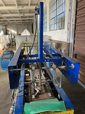 USED ELLIOTT MODEL 74 IMPACT CASE AUTOMATIC CASE SEALER