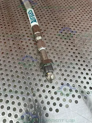 USED AIRGAS STAINLESS STEEL FLEXIBLE HOSE 75" W/ COMPRESSION FITTING, MALE THREADED