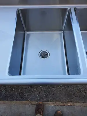Winholt 10'  3 Comp. Sink w/  2 DRBD & 2 Shelves.  New Encore Fixtures & Drains