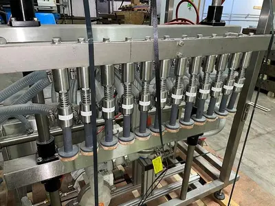USED APEX FILLING SYSTEMS POF-12 12 SPOUT PRESSURE LIQUID FILLER
