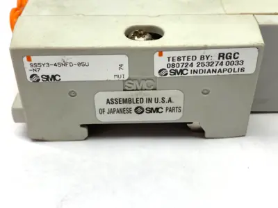 USED SMC PNEUMATIC MANIFOLD ASSEMBLY 1/4" PORTS 24VDC DAMAGED