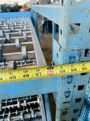 3 TIER 48" X 52" GRAVITY ROLLING RACK. STOCK # 0311921