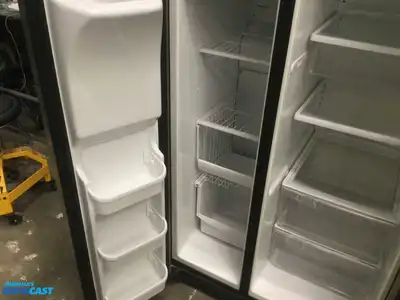 USED FRIGIDAIRE STAINLESS STEEL AND BLACK SIDE BY  SIDE REFRIDGERATOR HIGH EFFICANCY ENERGY STAR