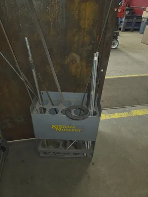 Hose clam rack, peg board with approximately 25 pegs, wire rack, rod rack with misc threaded rod.