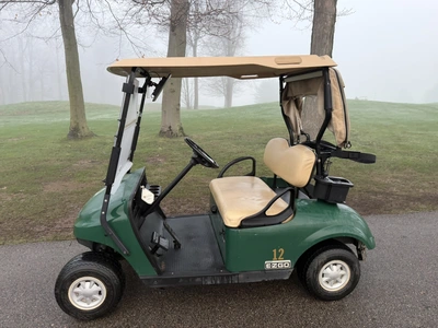 (1) 2015 E-Z-Go golf cart with a Kawasaki gas engine, includes canopy, ball cover, club cover, fold-...