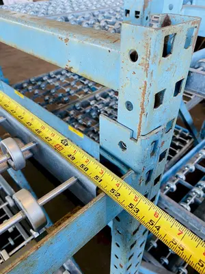 3 TIER 48" X 52" GRAVITY ROLLING RACK. STOCK # 0312021