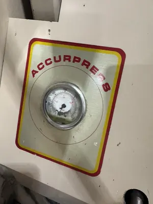 USED ACCURPRESS 7305