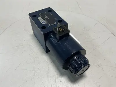 USED REXROTH 4WE 10 D33/CG24N9K4