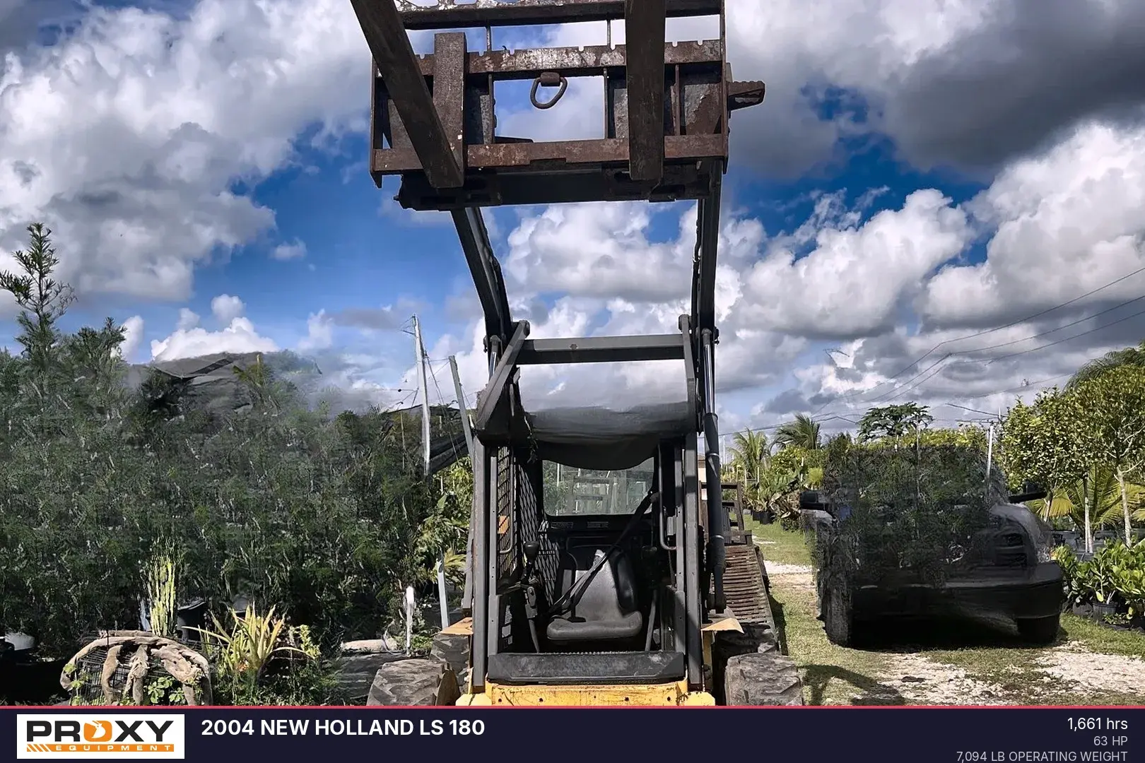 Used 2004 NEW HOLLAND LS 180 Skid Steer Loaders Florida US | Proxy Equipment #1377902