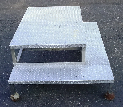 USED TWO STEP WORK PLATFORM 40 X 55 TWO STEP