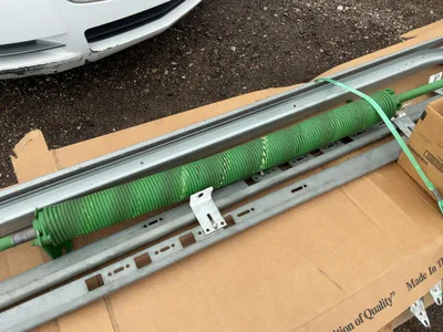 Used 8’ Tall x 10’ Wide Insulated Roll Up Door, comes with tracks, spring, and hardware, four panels...