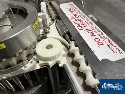 Unknown Rotary Capper, with Conveyor