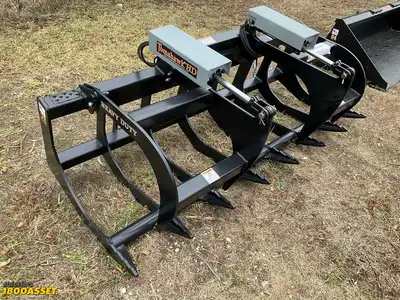 New Tomahawk 78” brush grapple attachment, two hydraulic grapple arms, skid steer quick attach