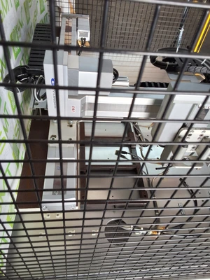 IAI RCS2-SS8R ROBOTIC SCREW DRIVING STATION WITH CAGE