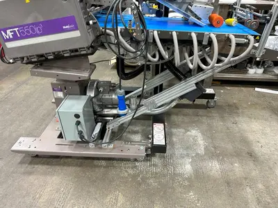 USED MFT 550 IP³ FEEDER AND LABELING SYSTEM